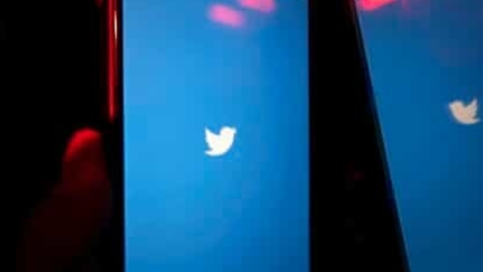 A mobile phone user turns on Twitter application on his smartphone in Moscow, Twitter says it will soon give users the the option to add and use security keys as your only authentication method, without any other methods turned on (AP Photo/Alexander Zemlianichenko)