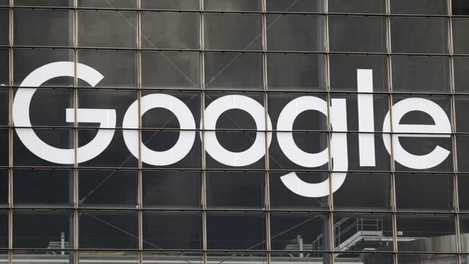 FILE PHOTO: The logo of Google is seen on a building at La Defense business and financial district in Courbevoie near Paris, France, September 1, 2020.  REUTERS/Charles Platiau/File Photo
