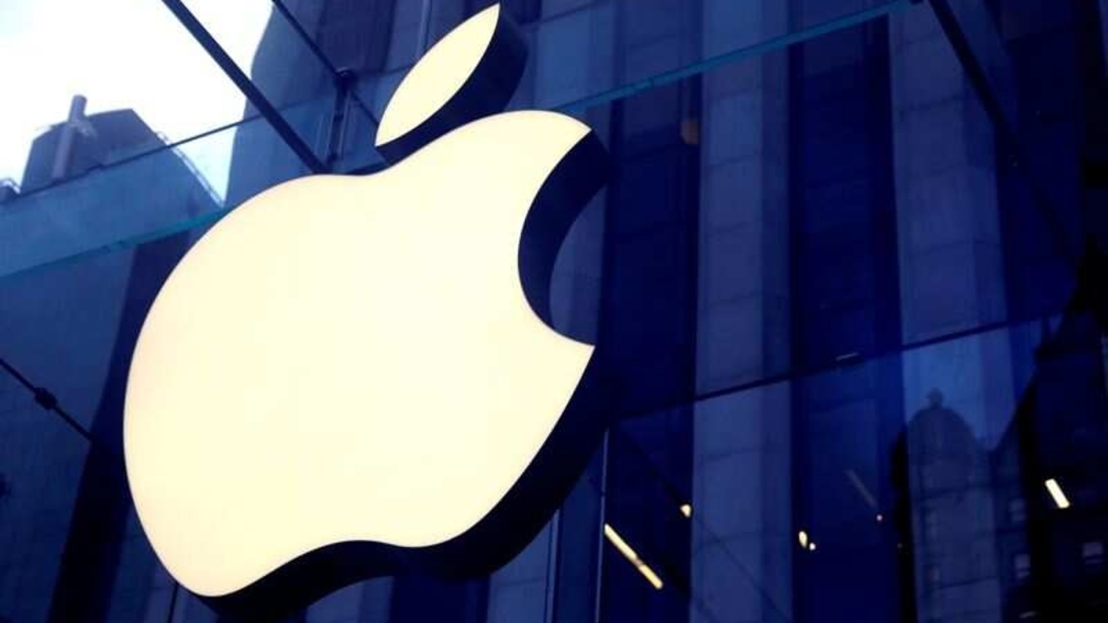 FILE PHOTO: The Apple Inc logo is seen hanging at the entrance to the Apple store on 5th Avenue in Manhattan, New York, U.S., October 16, 2019. REUTERS/Mike Segar