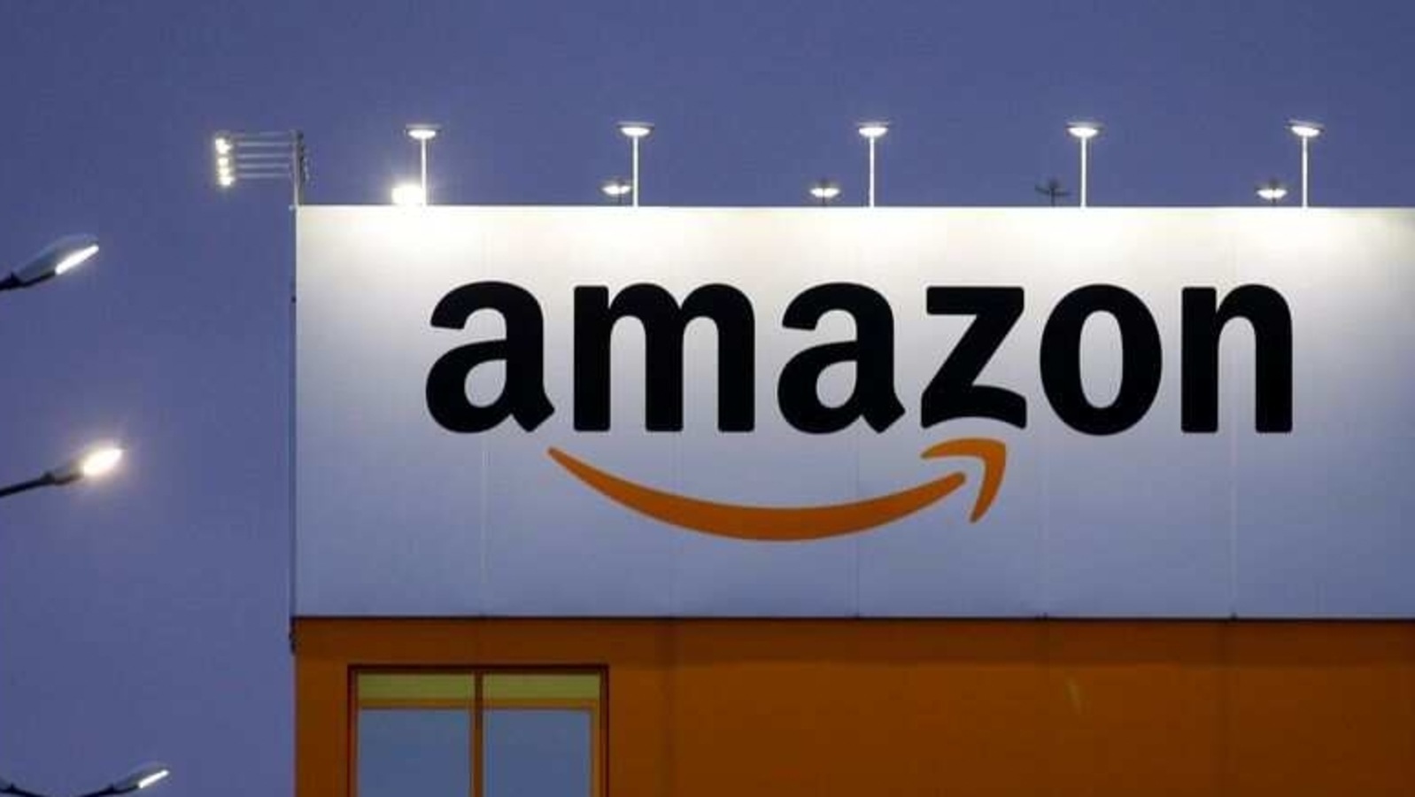 FILE PHOTO: The logo of Amazon is seen at the company logistics center in Lauwin-Planque, northern France, February 20, 2017. REUTERS/Pascal Rossignol/File Photo