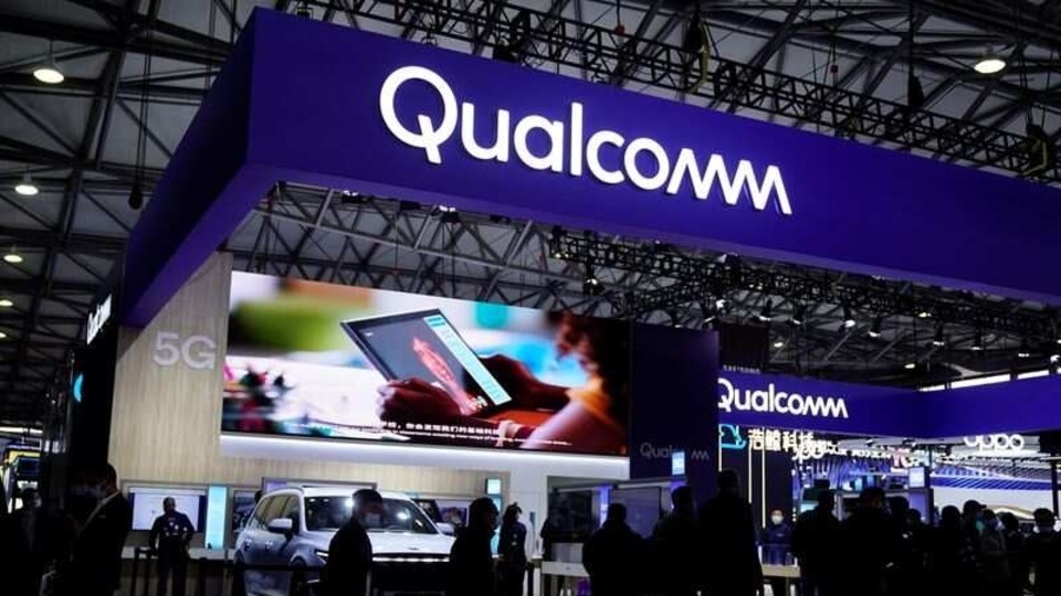 FILE PHOTO:   People visit a Qualcomm booth at the Mobile World Congress (MWC) in Shanghai, China February 23, 2021. REUTERS/Aly Song/File photo