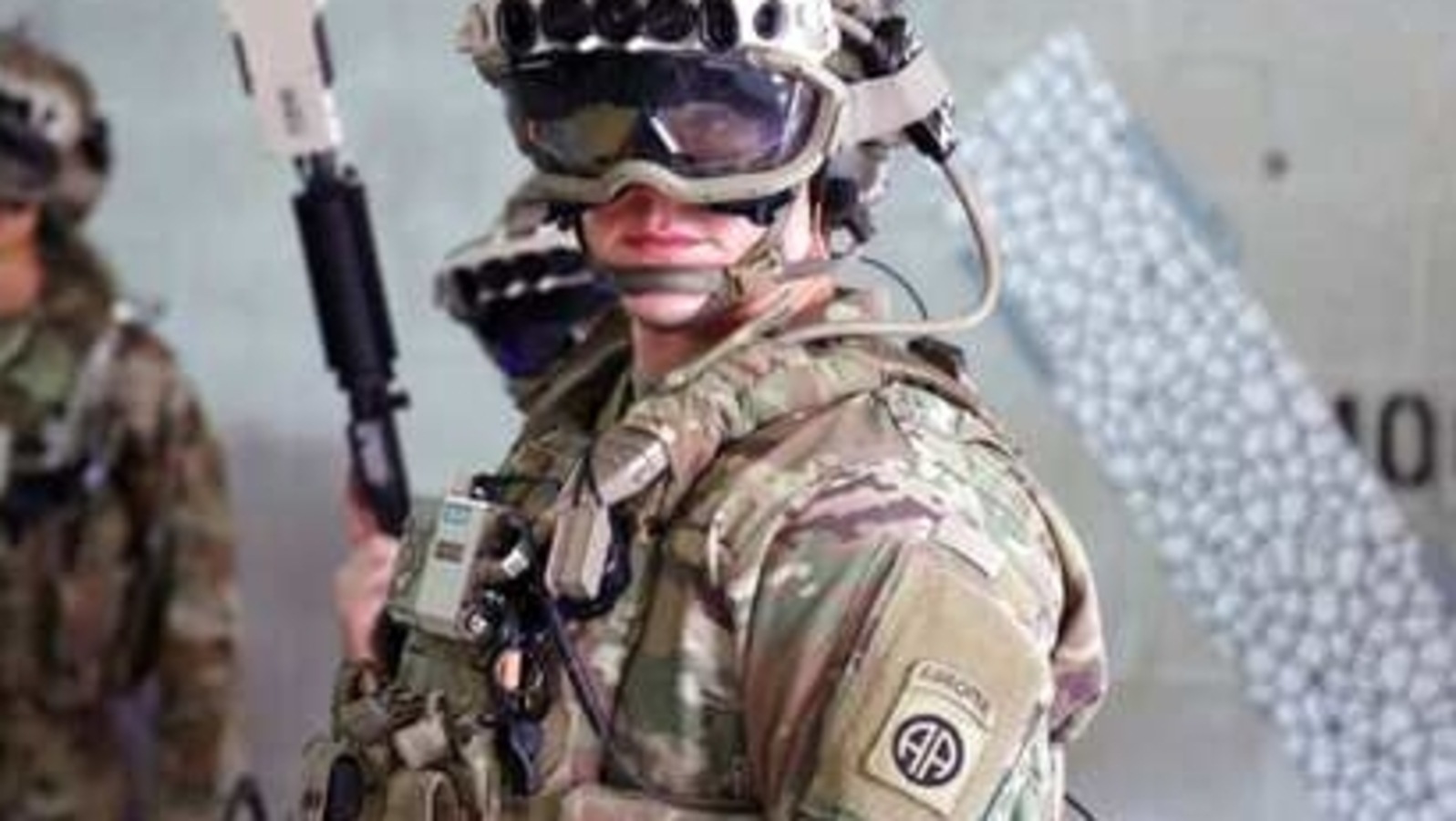 In this Oct. 21, 2020, photo provided by the U.S. Army, soldiers don a military prototype of the Army’s Integrated Visual Augmentation System (IVAS) and wield a Squad immersive Virtual Trainer (SiVT) during a training environment and test event at Fort Pickett, Va. Microsoft won a nearly $22 billion contract to supply U.S. Army combat troops with its virtual reality headsets. Microsoft and the Army separately announced the deal Wednesday, March 31, 2021. (Courtney Bacon/U.S. Army via AP) In this Oct. 21, 2020, photo provided by the U.S. Army, soldiers don a military prototype of the Army’s Integrated Visual Augmentation System (IVAS) and wield a Squad immersive Virtual Trainer (SiVT) during a training environment and test event at Fort Pickett, Va. Microsoft won a nearly $22 billion contract to supply U.S. Army combat troops with its virtual reality headsets. Microsoft and the Army separately announced the deal Wednesday, March 31, 2021. (Courtney Bacon/U.S. Army via AP)