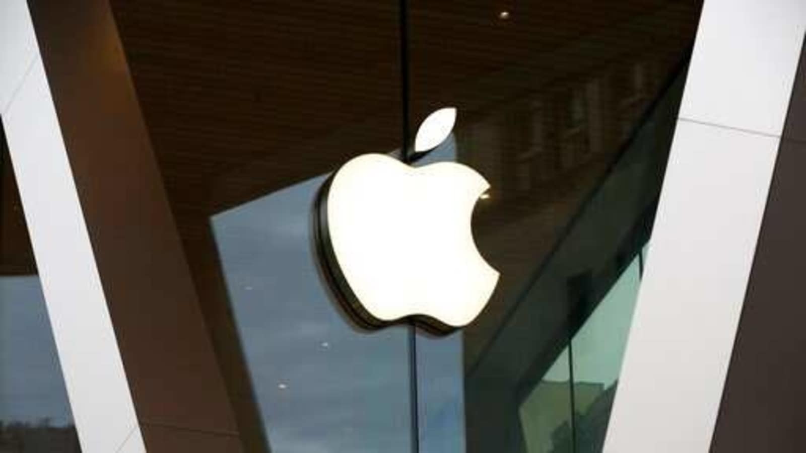 FILE - In this Saturday, March 14, 2020 file photo, an Apple logo adorns the facade of the downtown Brooklyn Apple store in New York. FILE - In this Saturday, March 14, 2020 file photo, an Apple logo adorns the facade of the downtown Brooklyn Apple store in New York.