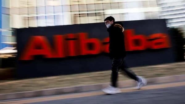 FILE PHOTO: The logo of Alibaba Group is seen at its office in Beijing, China Jan. 5, 2021. REUTERS/Thomas Peter/File Photo