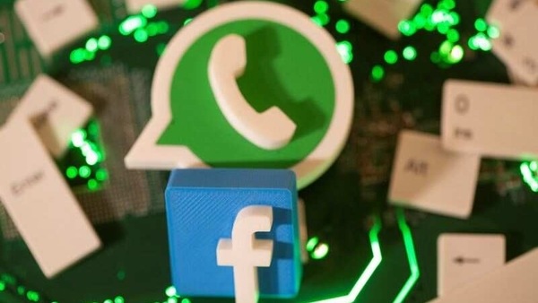 FILE PHOTO:  3D printed Facebook and WhatsApp logos and keyboard buttons are placed on a computer motherboard in this illustration taken January 21, 2021. REUTERS/Dado Ruvic/Illustration/File photo