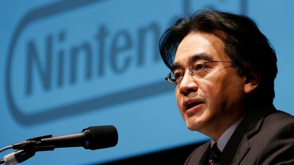 FILE - In this Jan. 31, 2013, file photo, then Nintendo Co. President Satoru Iwata speaks during a news conference in Tokyo. Nintendo's late president Iwata oversaw the video-game maker's global growth, helping make Super Mario and Pokemon household names. “Ask Iwata