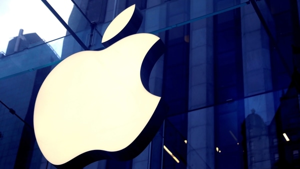 FILE PHOTO: The Apple Inc logo is seen hanging at the entrance to the Apple store on 5th Avenue in Manhattan, New York, U.S., October 16, 2019. REUTERS/Mike Segar/File Photo