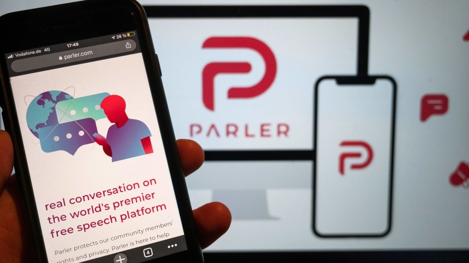 FILE - In this Jan. 10, 2021, file photo, the website of the social media platform Parler is displayed in Berlin. Amazon has accused Parler, the social network known as a conservative alternative to Twitter, of trying to conceal its ownership amid a legal dispute between Amazon and Parler stemming from the U.S. Capitol riots. The Seattle Times reported Tuesday, April 13 that Angelo Calfo, an attorney representing Parler, disputed the claim.  (Christophe Gateau/dpa via AP, File)