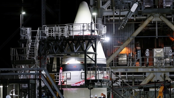 A stack of one of NASA's Artemis rocket solid rocket boosters are shown inside the massive Vehicle Assembly Building at Kennedy Space Center in Cape Canaveral, Florida. 
