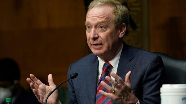 FILE PHOTO- In this Feb. 23, 2021, file photo Brad Smith, president of Microsoft Corporation, speaks on Capitol Hill in Washington, during a hearing on emerging technologies and their impact on national security.