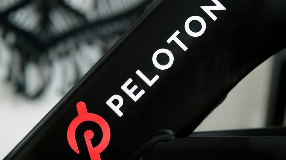 FILE PHOTO - This Nov. 19, 2019 file photo shows a Peloton logo on the company's stationary bicycle in San Francisco. Safety regulators are warning people with kids and pets to immediately stop using a treadmill made by Peloton after one child died and nearly 40 others were injured. The U.S. Consumer Product Safety Commission said Saturday, April 17, 2021,