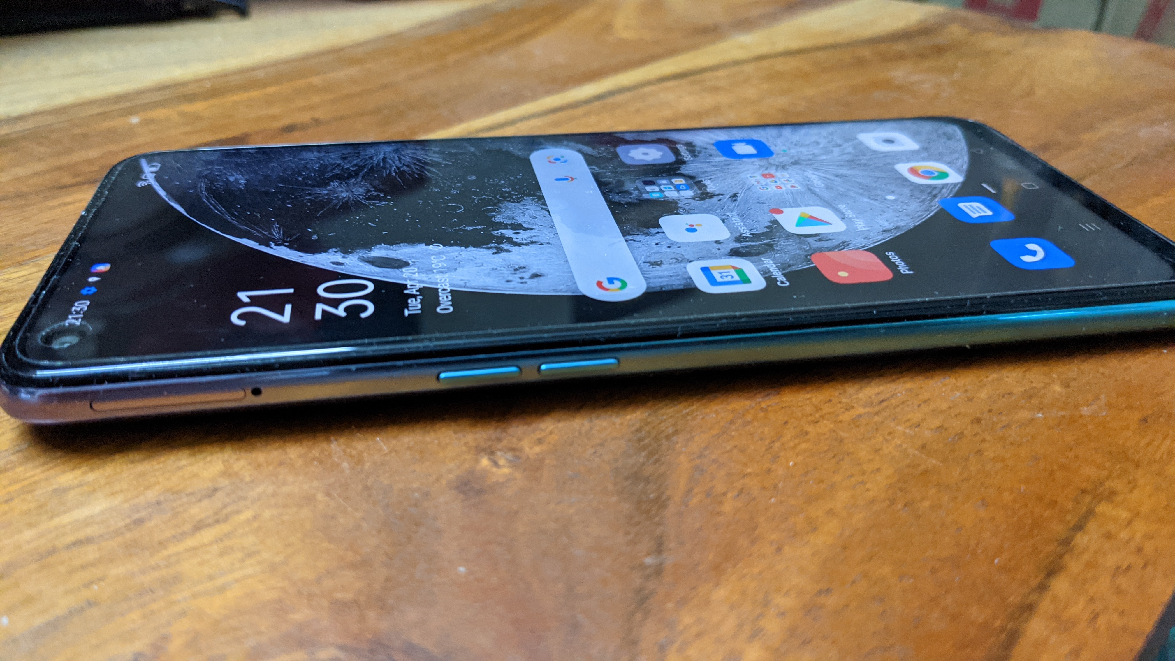 Oppo A74 5G features a 6.4-inch FHD+ display with a 90Hz refresh rate and 90.5% screen-to-body ratio with a bunch-hole for the selfie camera. The SIM card slot and the volume control buttons are on the left of the device. There is also a headphone jack. Oppo A74 5G features a 6.4-inch FHD+ display with a 90Hz refresh rate and 90.5% screen-to-body ratio with a bunch-hole for the selfie camera. The SIM card slot and the volume control buttons are on the left of the device. There is also a headphone jack.