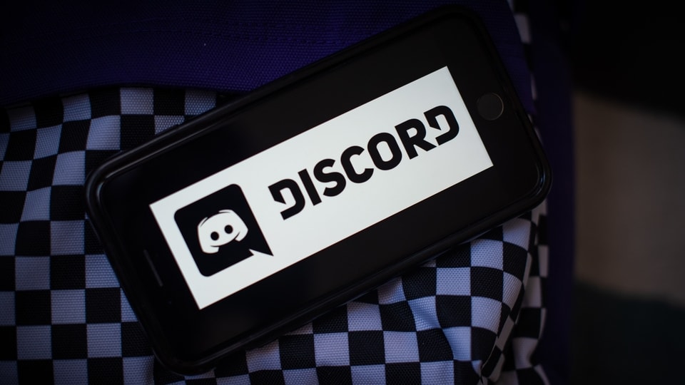 The Discord Inc. logo on a smartphone arranged in Hastings-on-Hudson, New York, on Tuesday, March 23, 2021. Photographer: Tiffany Hagler-Geard/Bloomberg