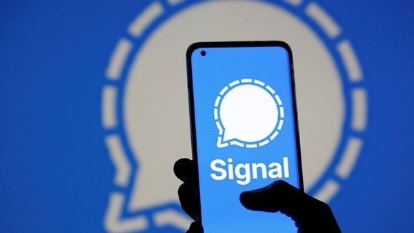 FILE PHOTO: The Signal messaging app logo is seen on a smartphone, in front of the same displayed same logo, in this illustration taken, January 13, 2021.