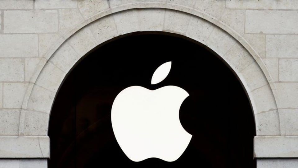 FILE PHOTO: Apple logo is seen on the Apple store at The Marche Saint Germain in Paris, France July 15, 2020.  REUTERS/Gonzalo Fuentes