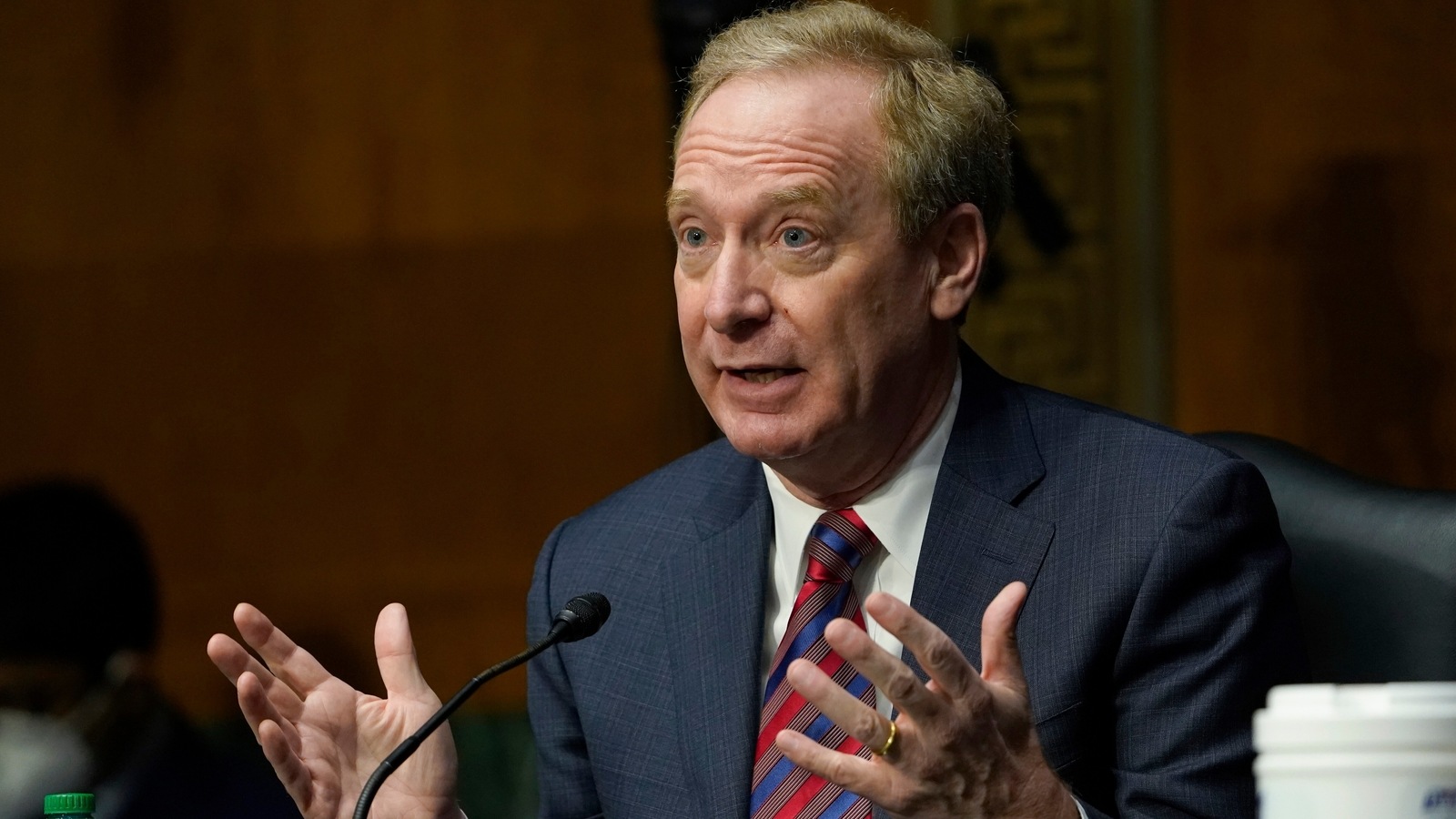 FILE - In this Feb. 23, 2021, file photo Brad Smith, president of Microsoft Corporation, speaks on Capitol Hill in Washington, during a hearing on emerging technologies and their impact on national security. 