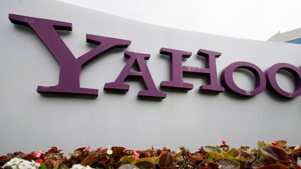 FILE - The Yahoo logo is displayed outside of offices in Santa Clara, Calif., in this Monday, April 18, 2011, file photo. Verizon is selling the segment of its business that includes Yahoo and AOL to private equity firm Apollo Global Management in a $5 billion deal. Verizon said Monday, May 3, 2021, that it will keep a 10% stake in the new company, which will be called Yahoo. (AP Photo/Paul Sakuma, File)