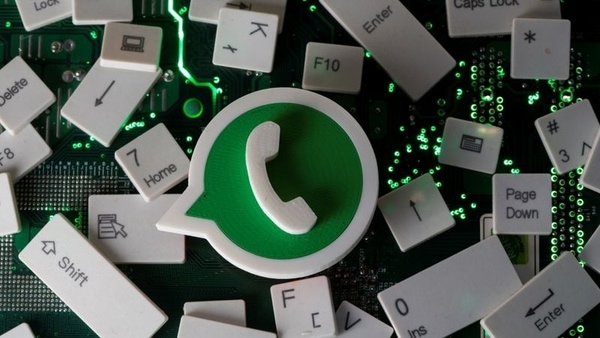 FILE PHOTO: A 3D printed Whatsapp logo and keyboard buttons are placed on a computer motherboard in this illustration taken January 21, 2021. 