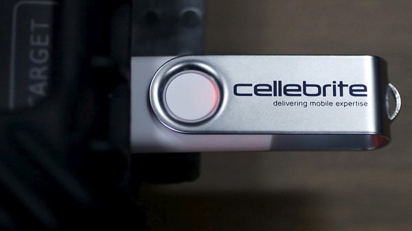 FILE PHOTO: A USB device is attached to Cellebrite UFED TOUCH, a device to extract data from a mobile device as demonstrated by Japanese electronics maker Sun Corp during a photo opportunity at the company's Tokyo office in Tokyo March 30, 2016.