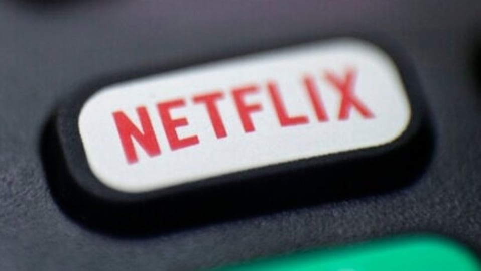 FILE - This Aug. 13, 2020 file photo shows a logo for Netflix on a remote control in Portland, Ore. Streaming services ranging from Netflix to Disney+ want us to stop sharing passwords. That's the new edict from the giants of streaming media, who hope to discourage the common practice of sharing account passwords without alienating their subscribers, who've grown accustomed to the hack. (AP Photo/Jenny Kane, File)