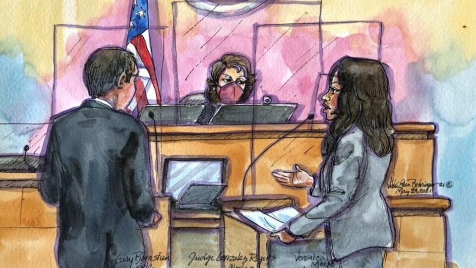 Apple attorney Veronica Moye and Gary Bornstien from Epic speak with Judge Yvonne Gonzalez Rogers during a weeks-long antitrust trial at federal court in Oakland, California, U.S. May 24, 2021 in this courtroom sketch.  REUTERS/Vicki Behringer