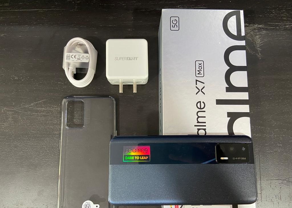 Inside the box, you get a 50W charger along with a cable. Realme has also included a TPU case inside the box.