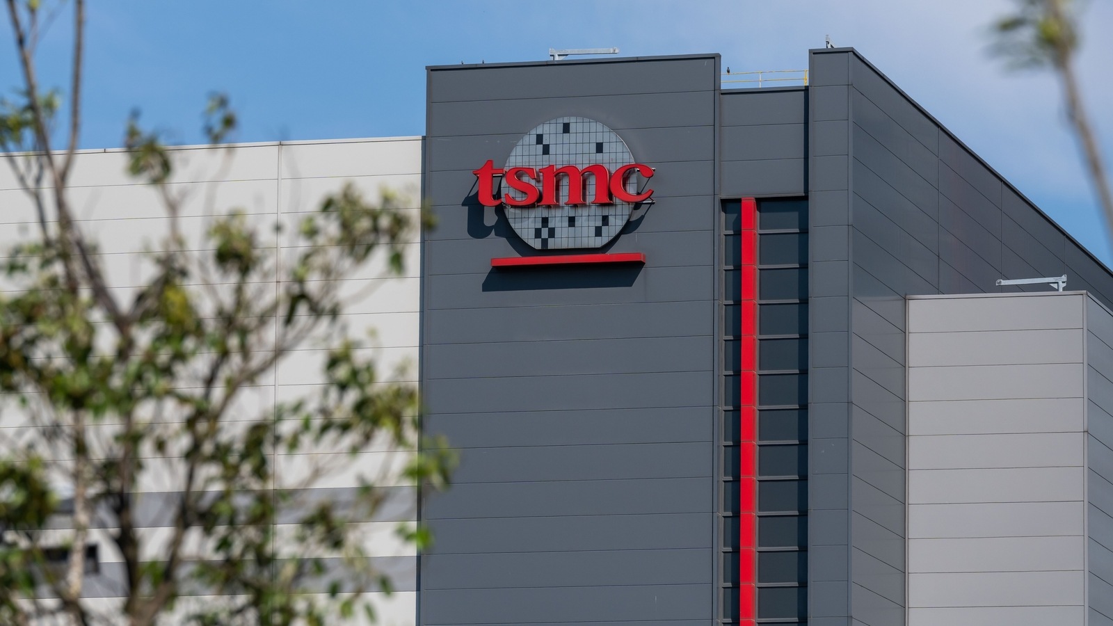 Logo at the Taiwan Semiconductor Manufacturing Co. headquarters in Hsinchu, Taiwan, on Wednesday, April 7, 2021. Logo at the Taiwan Semiconductor Manufacturing Co. headquarters in Hsinchu, Taiwan, on Wednesday, April 7, 2021.