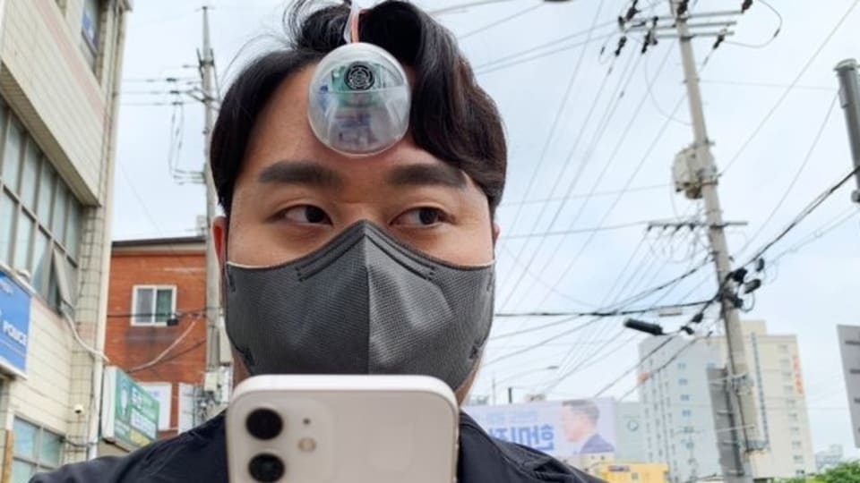 South Korean industrial designer Paeng Min-wook showcases a robotic eye, called 