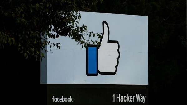 FILE PHOTO: The entrance sign to Facebook headquarters is seen in Menlo Park, California, on Wednesday, October 10, 2018. REUTERS/Elijah Nouvelage/File Photo