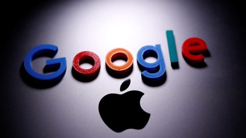 A 3D printed Google logo is placed on the Apple Macbook in this illustration taken April 12, 2020. REUTERS/Dado Ruvic/Illustration