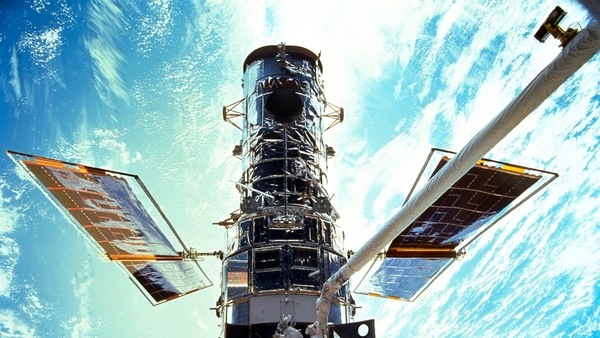 The Hubble Space Telescope has been blindsided by computer trouble, with all astronomical viewing halted, NASA said Wednesday, June 16, 2021. The orbiting observatory has been idle since Sunday when a 1980s-era computer that controls the science instruments shut down, possibly because of a bad memory board.