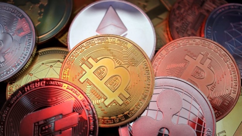 FILE PHOTO: Representations of cryptocurrencies including Bitcoin, Dash, Ethereum, Ripple and Litecoin are seen in this illustration picture taken June 2, 2021. REUTERS/Florence Lo/Illustration