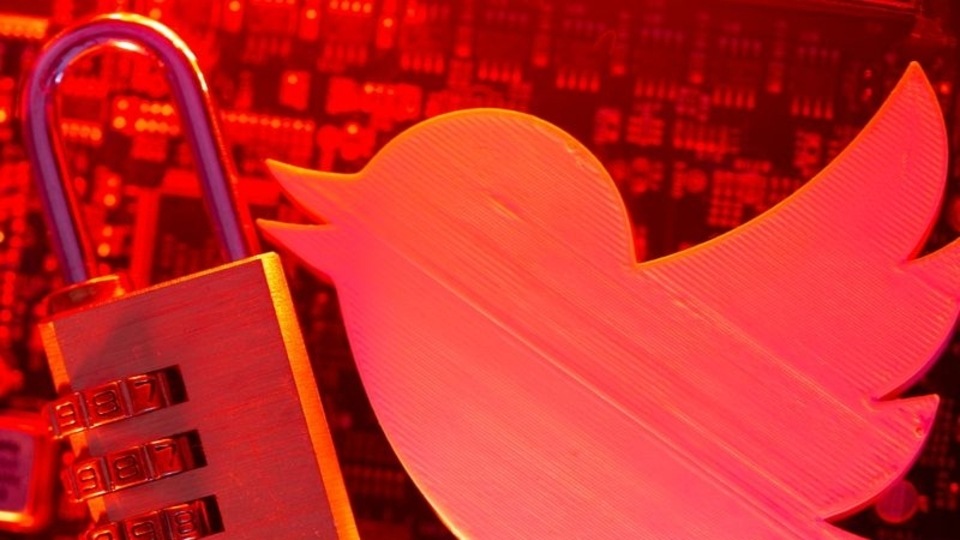 FILE PHOTO: A 3D printed Twitter logo and a padlock are placed on a computer motherboard in this illustration picture taken May 4, 2021. REUTERS/Dado Ruvic/Illustration