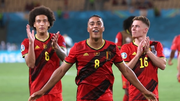Euro 2020: Belgium's Youri Tielemans, Axel Witsel and Thorgan Hazard celebrate after the match at the La Cartuja Stadium, Seville, Spain on June 27, 2021. FILE PHOTO: 