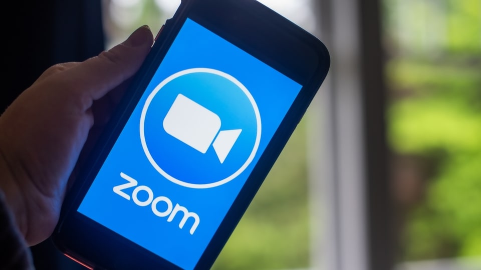 The Zoom Video Communications Inc. logo on a smartphone arranged in Dobbs Ferry, New York, U.S., on Saturday, May 29, 2021. Zoom Video Communications Inc. is scheduled to release earnings figures on June 1.