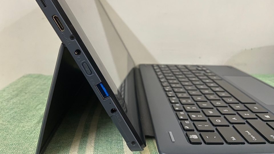 On the left side of the Avita Cosmos 2-in-1 convertible notebook is a MicroSD card reader, a mini HDMI port, 3.5mm headphone port, power button and the power input. (Image resized for web)