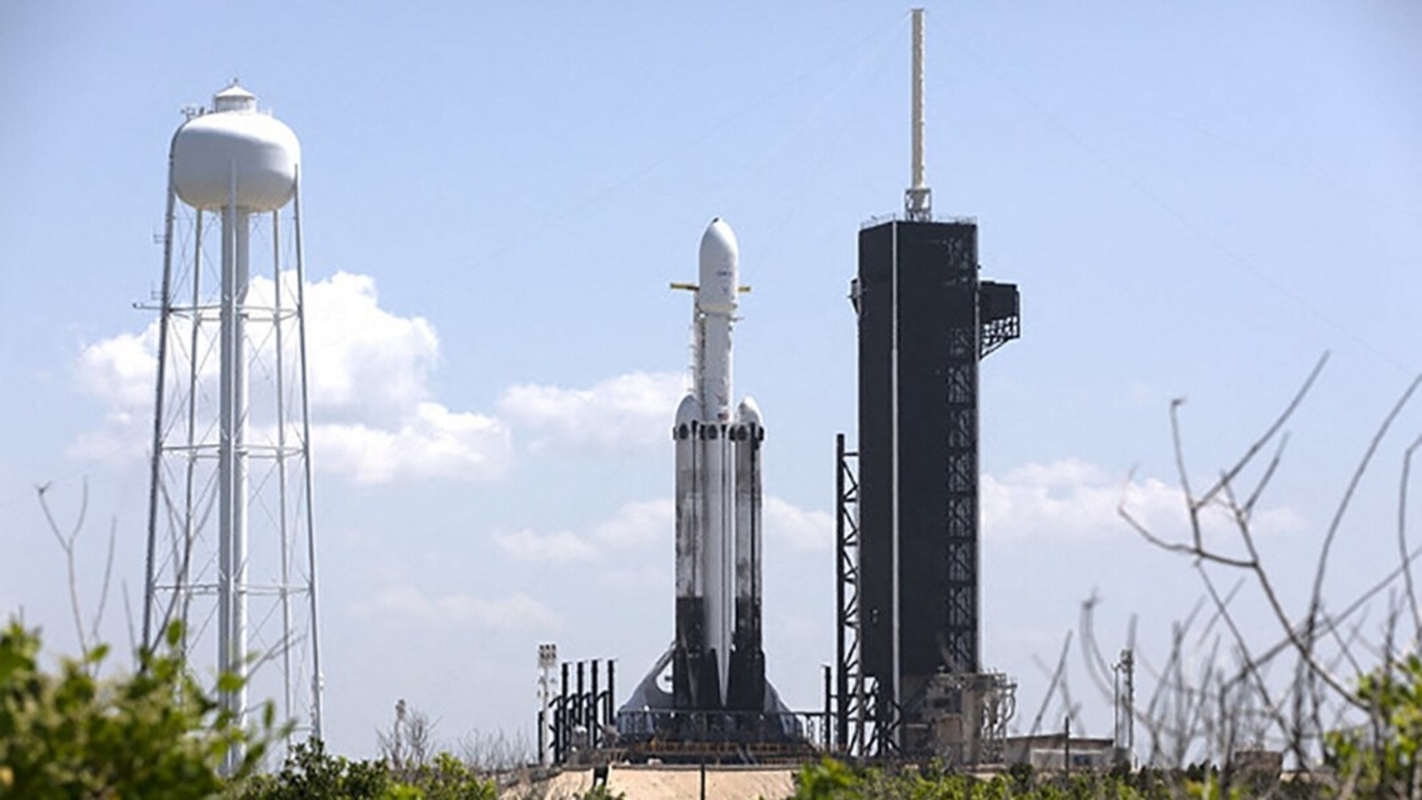 This SpaceX photo released by NASA on June 24, 2019 shows SpaceX Falcon Heavy rocket ready for launch on the pad at Launch Complex 39A at NASA's Kennedy Space Center in Florida. NASA said it had selected SpaceX to launch a planned voyage to Jupiter's icy moon Europa, a huge win for Elon Musk's company as it sets its sights deeper into the solar system. 