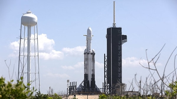 This SpaceX photo released by NASA on June 24, 2019 shows SpaceX Falcon Heavy rocket ready for launch on the pad at Launch Complex 39A at NASA's Kennedy Space Center in Florida. NASA said it had selected SpaceX to launch a planned voyage to Jupiter's icy moon Europa, a huge win for Elon Musk's company as it sets its sights deeper into the solar system.