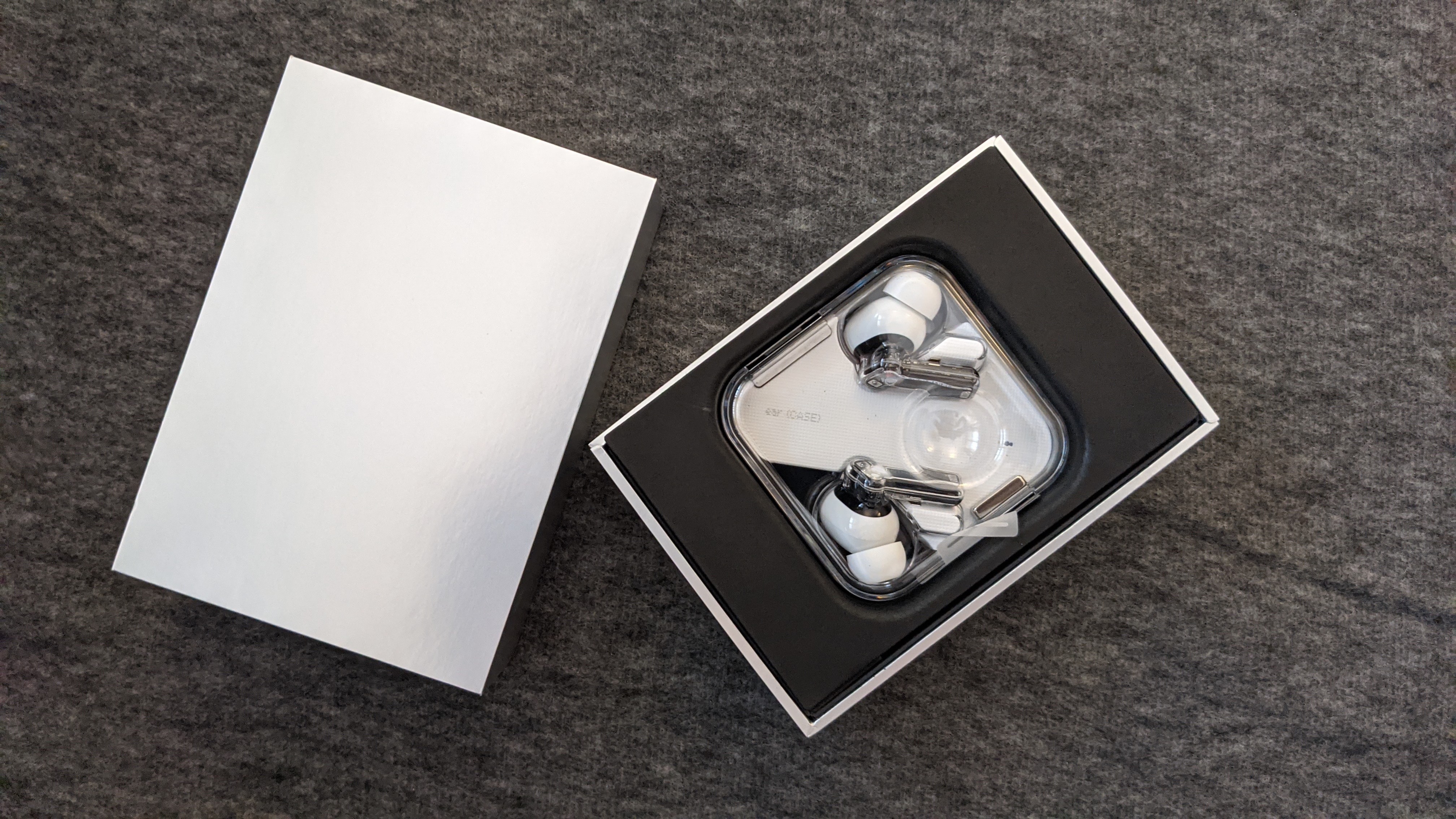The ear (1) buds sport a transparent look so you can see right inside and spot the microphones, circuit board, and magnets. The ear (1) buds sport a transparent look so you can see right inside and spot the microphones, circuit board, and magnets.