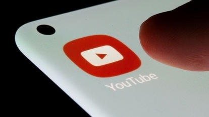 FILE PHOTO: YouTube app is seen on a smartphone in this illustration taken, July 13, 2021. REUTERS/Dado Ruvic/Illustration