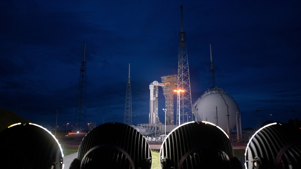 A United Launch Alliance Atlas V rocket with Boeing's CST-100 Starliner spacecraft aboard is illuminated on the launch pad ahead of the Orbital Flight Test-2 mission, Monday, Aug. 2, 2021, at Cape Canaveral, Fla. Starliner, without a crew, is expected dock with the International Space Station as part of NASA's Commercial Crew Program.