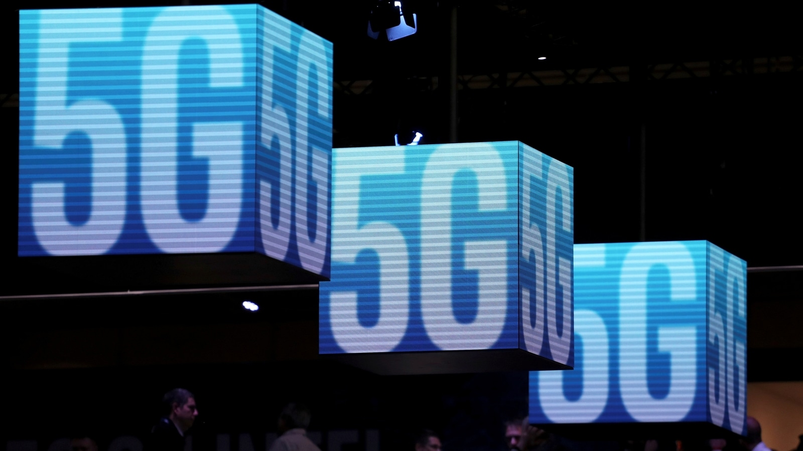 FILE PHOTO: Hanging cubes display 5G logos at the Mobile World Congress in Barcelona, Spain, February 26, 2019. REUTERS/Sergio Perez/File Photo