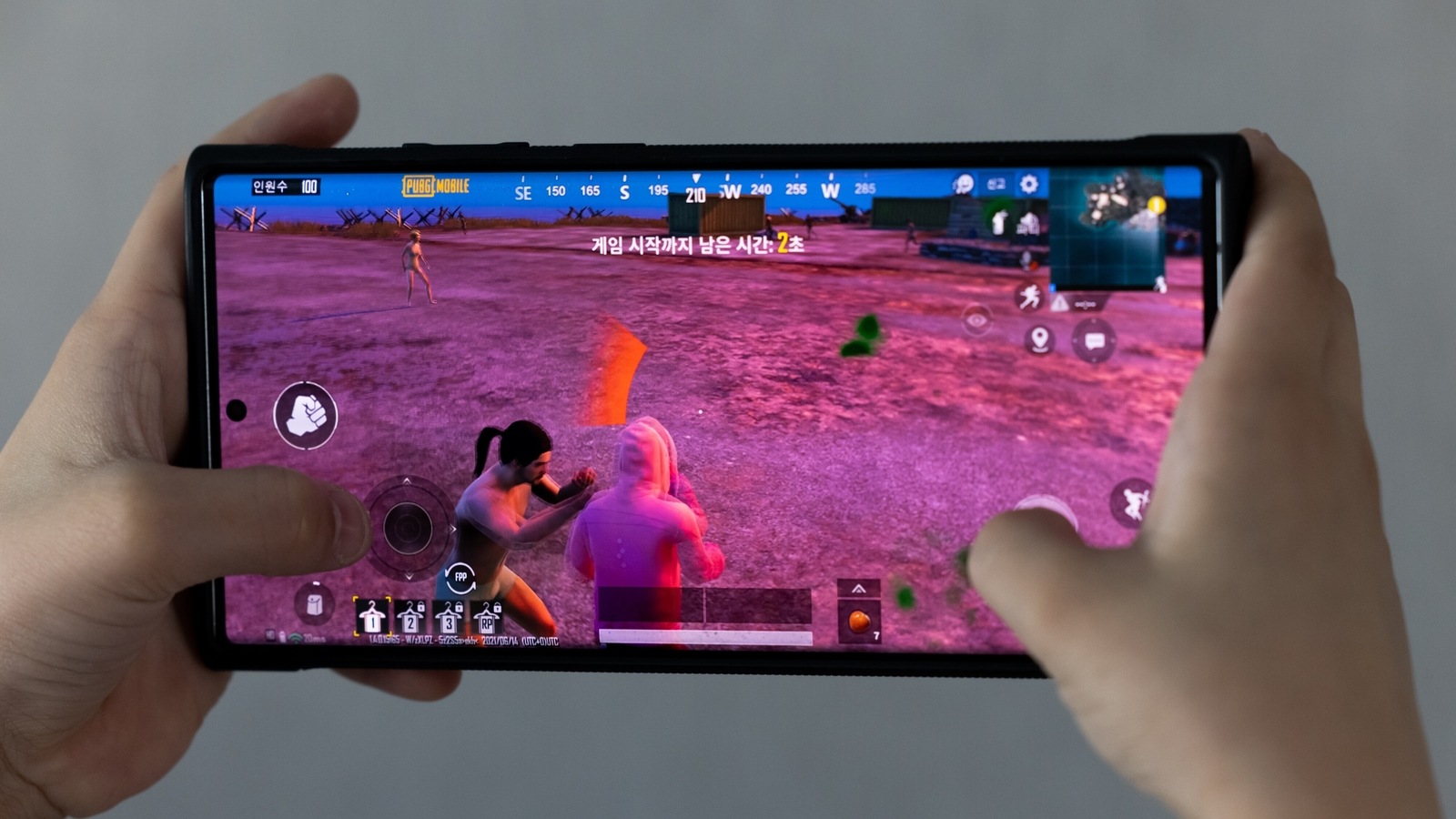 The PlayerUnknown's Battlegrounds (PUBG) video game is arranged on a smartphone in Seoul, South Korea, on June 15, 2021. Krafton Inc., the company behind the hit mobile game PUBG, filed to raise as much as 5.6 trillion won ($5 billion) in a South Korean initial public offering that is set to be the country�s largest ever. Photographer: SeongJoon Cho/Bloomberg