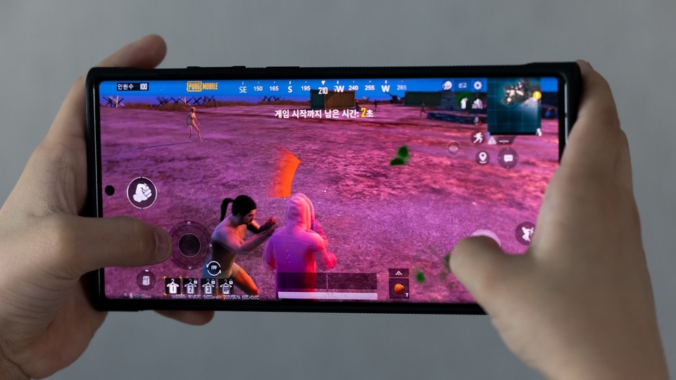 The PlayerUnknown's Battlegrounds (PUBG) video game is arranged on a smartphone in Seoul, South Korea, on June 15, 2021. Krafton Inc., the company behind the hit mobile game PUBG, filed to raise as much as 5.6 trillion won ($5 billion) in a South Korean initial public offering that is set to be the country�s largest ever. Photographer: SeongJoon Cho/Bloomberg
