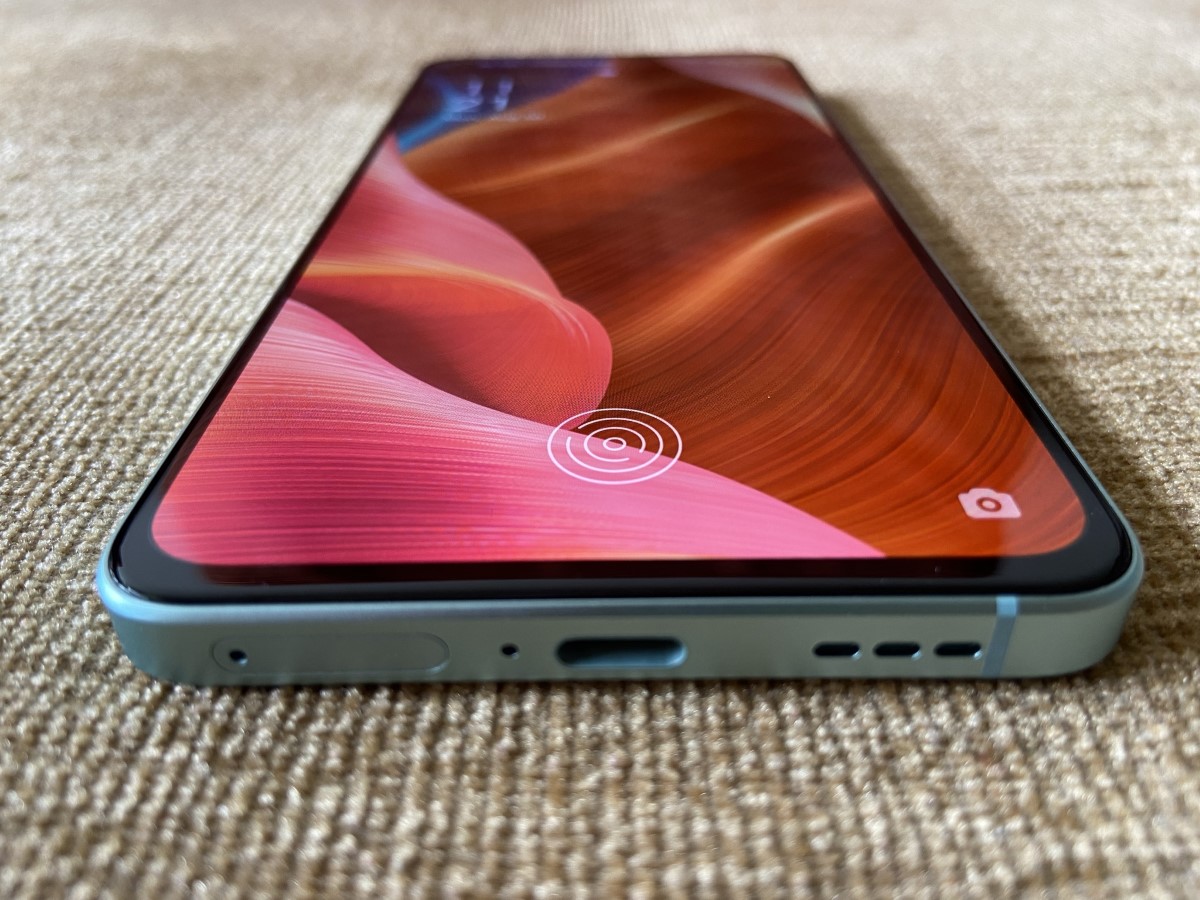 The Oppo Reno 6 5G's in-screen fingerprint sensor is fast. We wish Oppo had included stereo speakers, though. (Image resized for web)