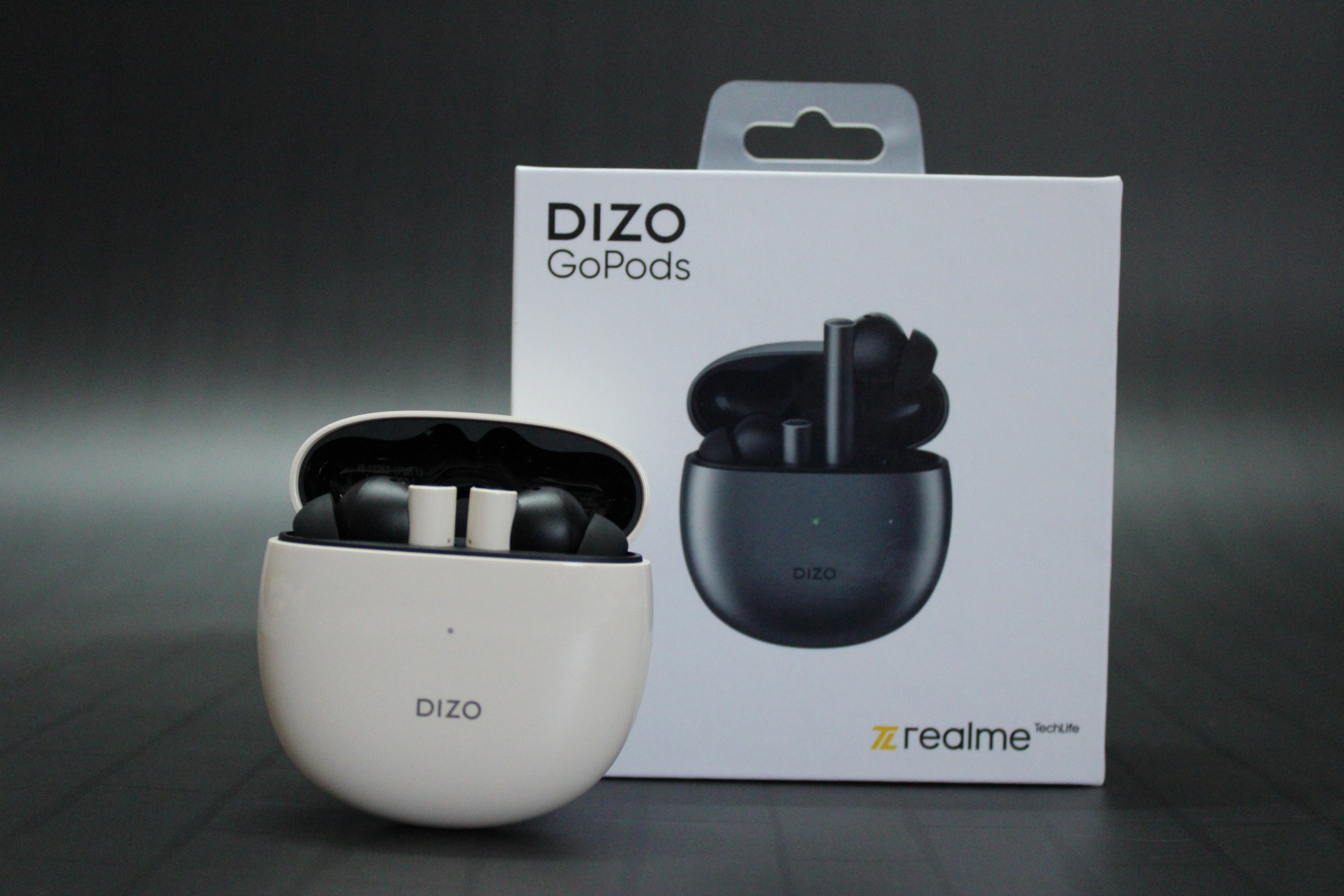The Dizo GoPods come equipped with an “intelligent R2 chip that is said to help optimize voice and music signals for low power consumption. We have had the devices for just a day so we are yet to test the battery life and form an opinion on the same. However, in terms of specs, the GoPods earbuds house a 30mAh battery each, while the case packs a 400mAh battery. It is rated to last up to 25 hours and can offer 120 minutes of playback with a 10 minutes charge. They are rated IPX5 for sweat resistance. The Dizo GoPods come equipped with an “intelligent R2 chip that is said to help optimize voice and music signals for low power consumption. We have had the devices for just a day so we are yet to test the battery life and form an opinion on the same. However, in terms of specs, the GoPods earbuds house a 30mAh battery each, while the case packs a 400mAh battery. It is rated to last up to 25 hours and can offer 120 minutes of playback with a 10 minutes charge. They are rated IPX5 for sweat resistance.