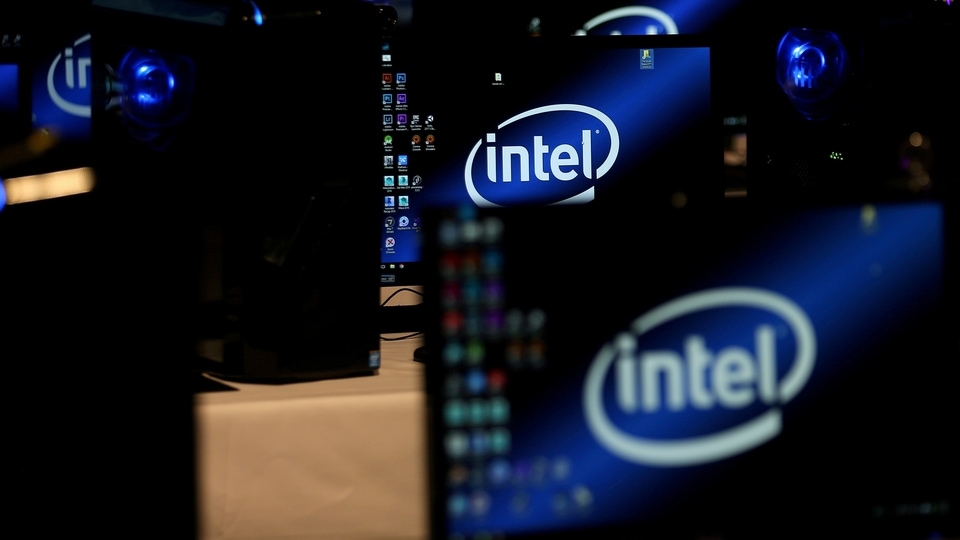 FILE PHOTO: The Intel logo is displayed on computer screens at SIGGRAPH 2017 in Los Angeles, California, U.S. July 31, 2017.  REUTERS/Mike Blake/File Photo
