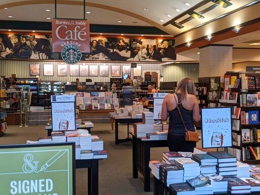 A table displays signs with #BookTok, at a Barns and Noble in Scottsdale, Arizona. tiktok
