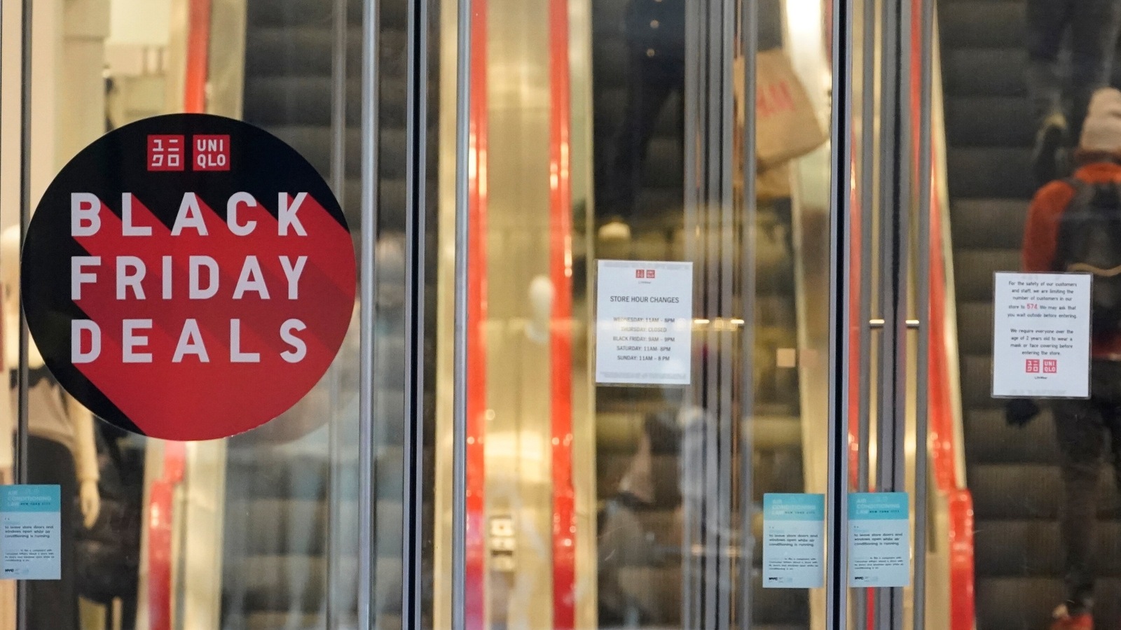 Black Friday Sale 2021: Uniqlo store along Fifth Avenue, Friday, in New York. The fallout from the pandemic continues to weigh on businesses and shoppers' minds. Black Friday Sale 2021