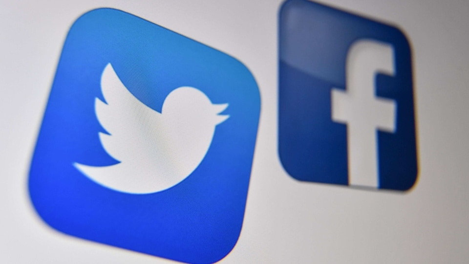 The trade groups claim the law would force Twitter, Facebook and Alphabet Inc.’s Google to host extremist content in violation of their user policies, (Photo by Denis Charlet / AFP)